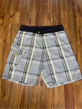 Analog Gray Plaid Swim Board Shorts with Black Waistband and Yellow Accents